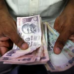 Indian rupee hits 95 mark against dollar