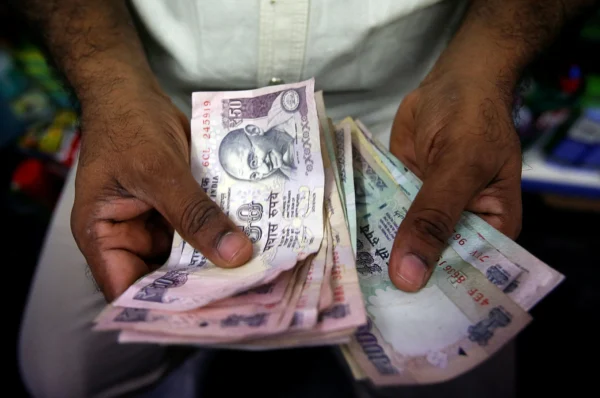 Indian rupee hits 95 mark against dollar
