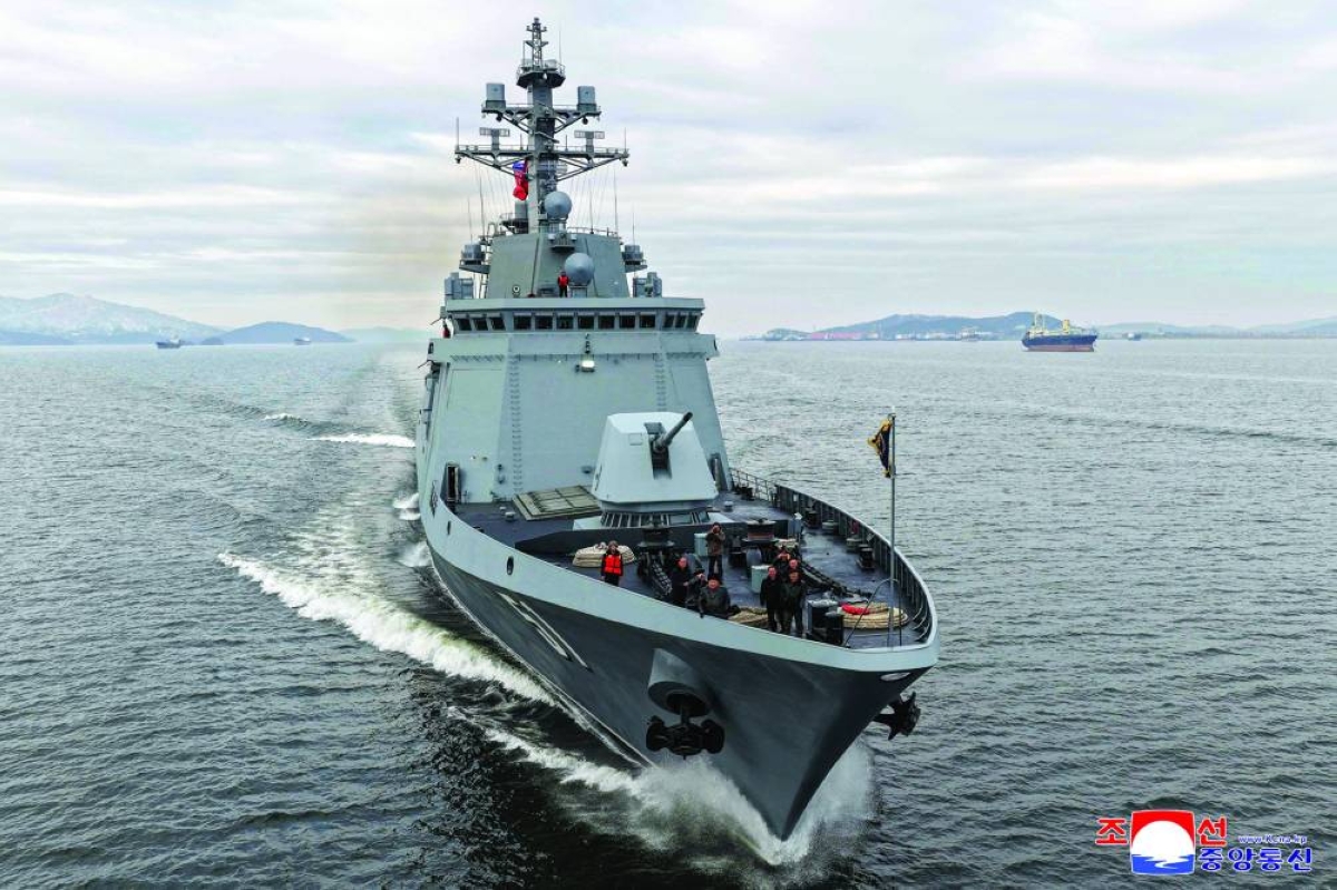 N Korea’s Kim oversees naval destroyer, cruise missile test