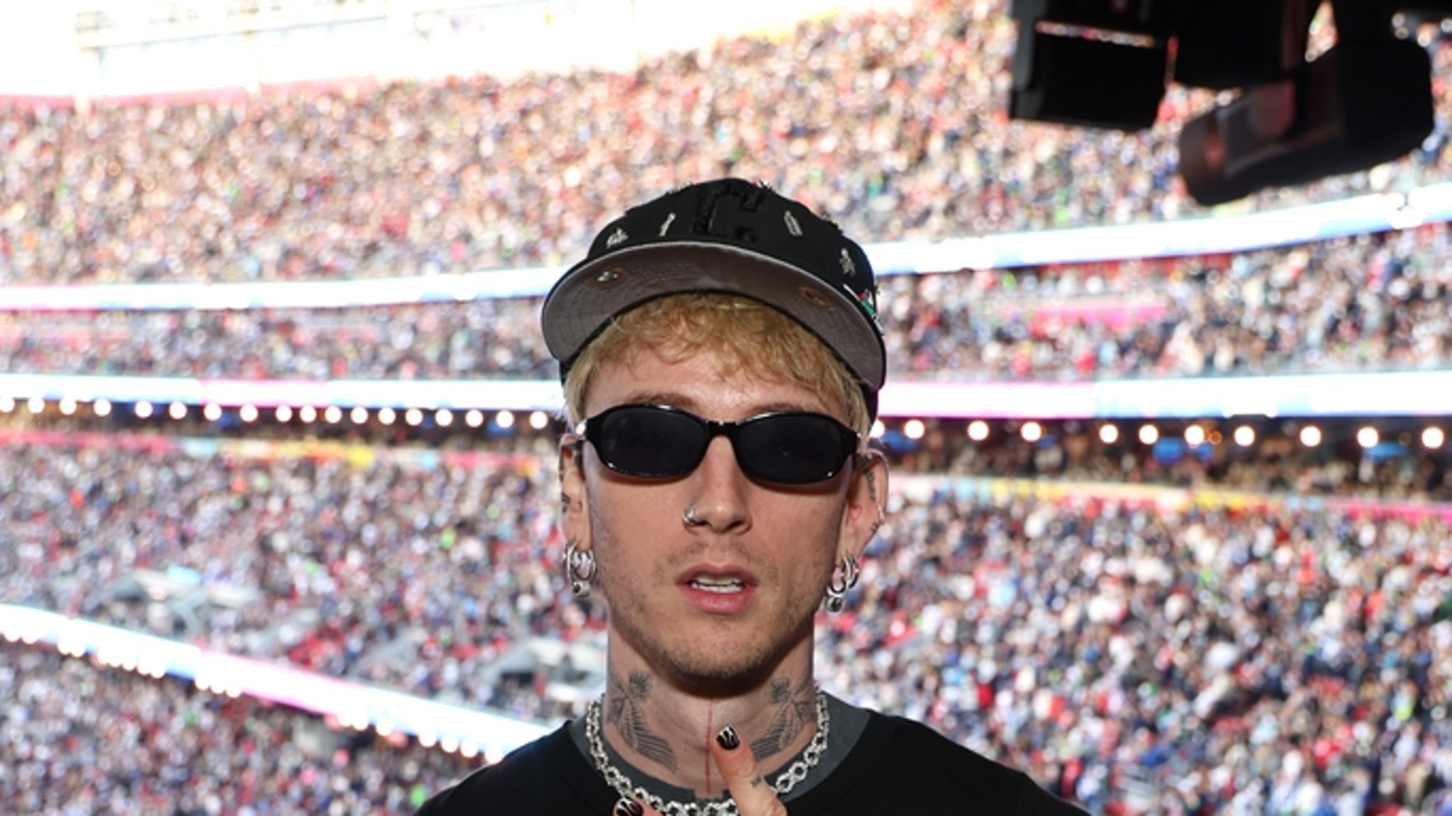 Machine Gun Kelly Sees Fan Fall Through Stage During Concert, Video Shows
