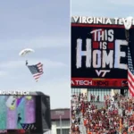 Skydiver gets parachute caught on scoreboard at Vi…