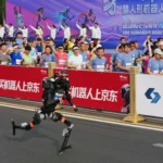 Humans far behind as robot breaks record at Beijing half-marathon