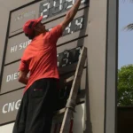 Oil prices dip, stocks rise on lingering Iran peace hopes