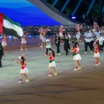 Humaid and Marwa carry UAE flag at Asian Beach Games opening ceremony