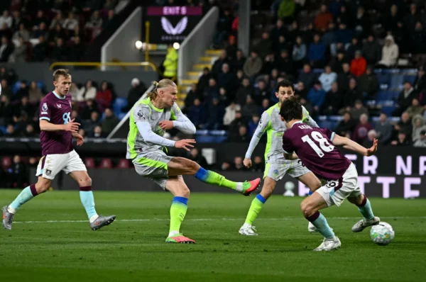 Manchester City go top of Premier League as Burnley relegated