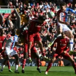 Liverpool close in on CL, Hammers and Spurs win in battle for survival