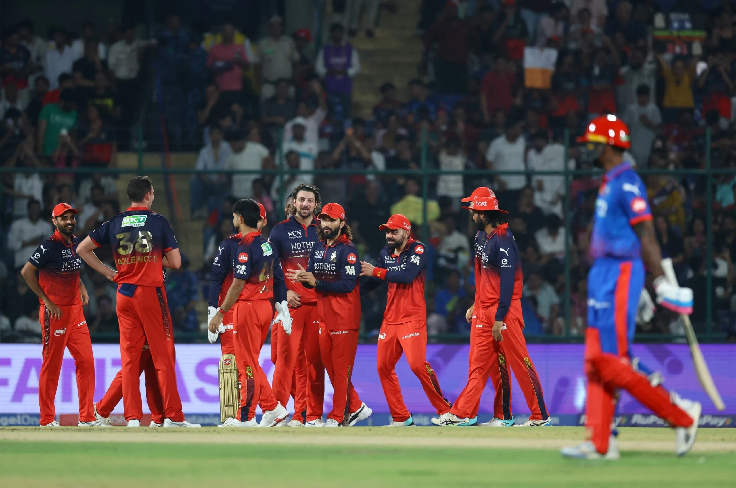 Hazlewood, Kumar spark Delhi collapse as RCB romp to victory