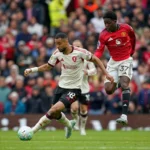 United edge Liverpool to seal Champions League spot, Bour…