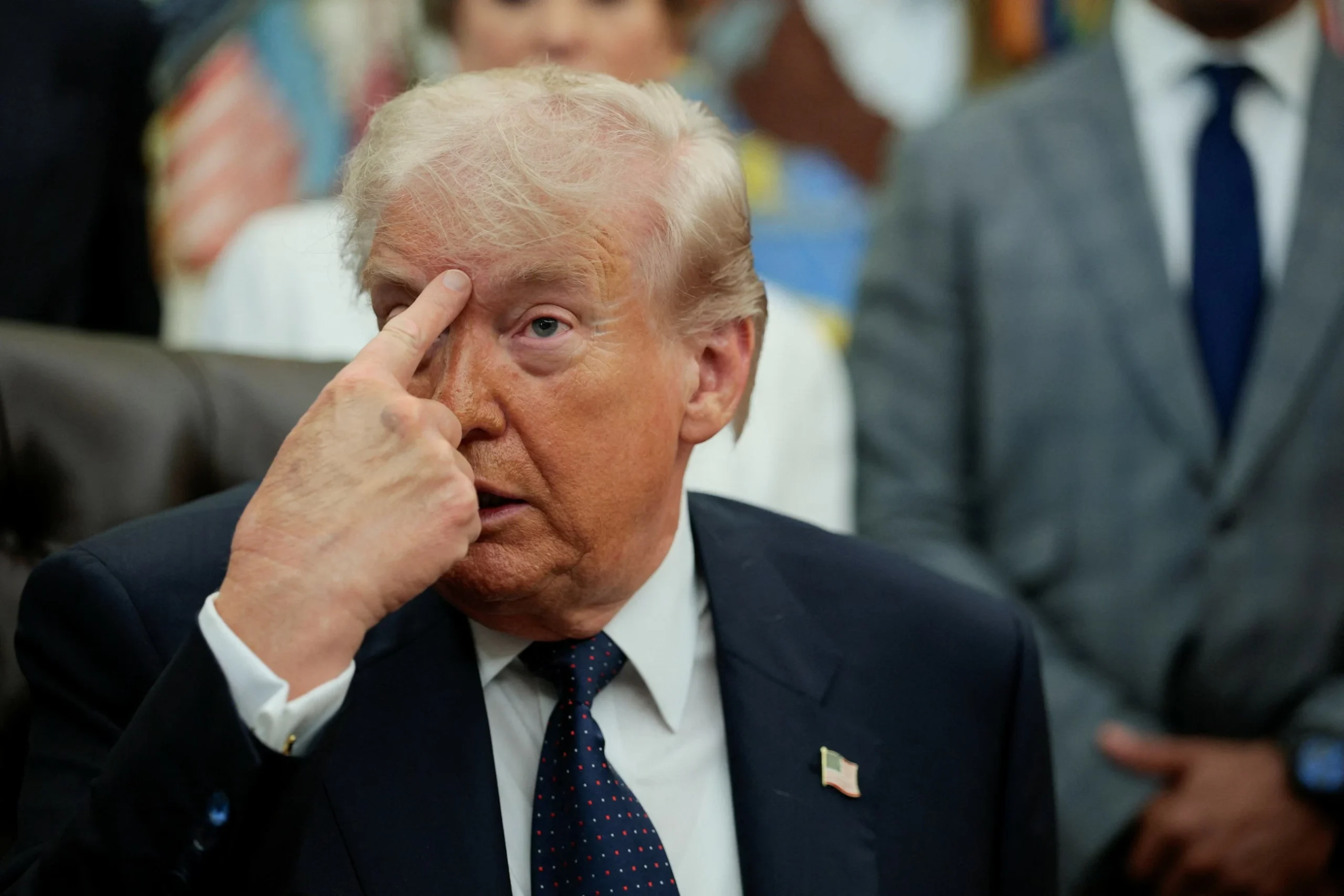 US pauses Hormuz escorts, Trump says progress on Iran deal