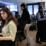 Wall Street climbs, Dow at record high with US-Iran talks in spotlight