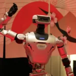 Humanoids dance and thread needles as Japanese robotics d…