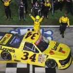Layne Riggs delivers last-lap pass for Truck Series win at Nashville