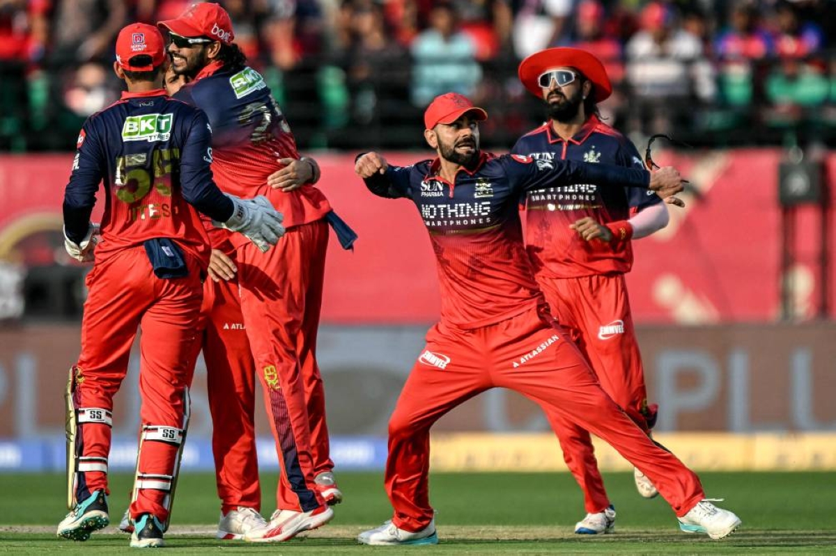 Kohli, Venkatesh dazzle as Bengaluru qualify for IPL play-offs