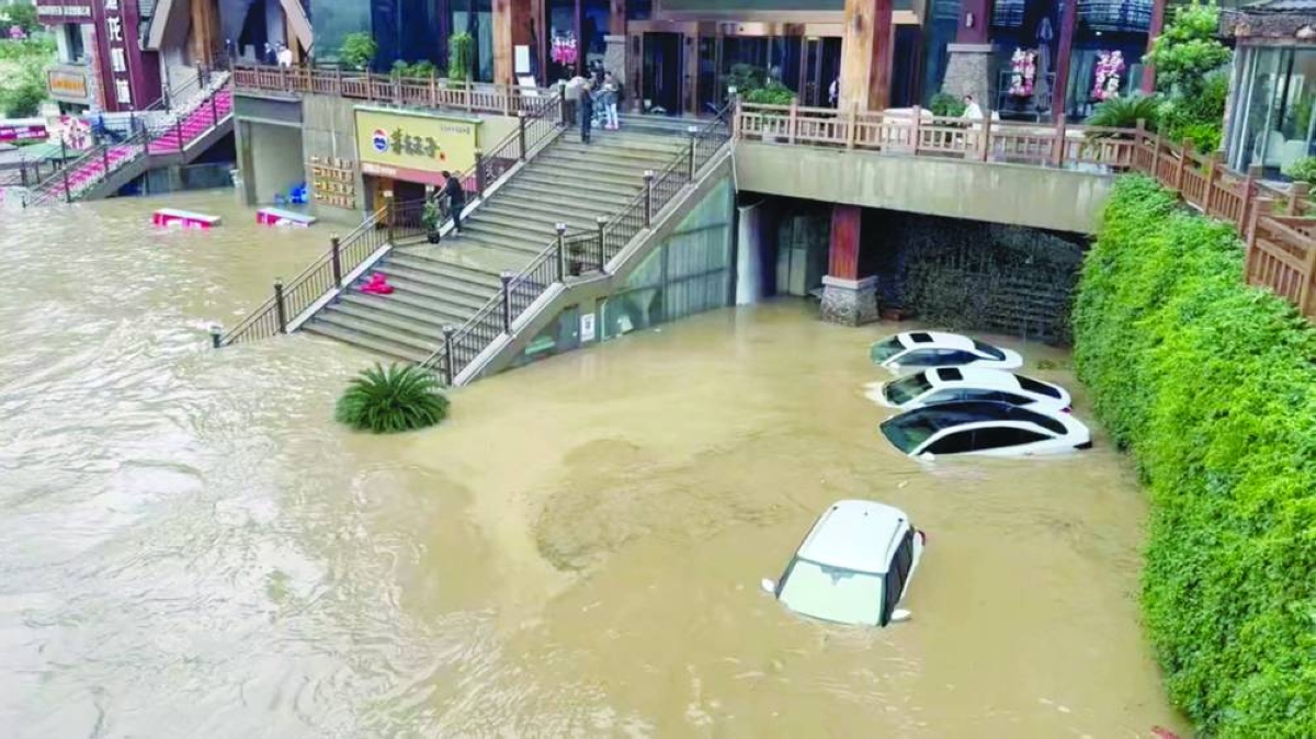 At least 21 killed as heavy rains drench southern, central China