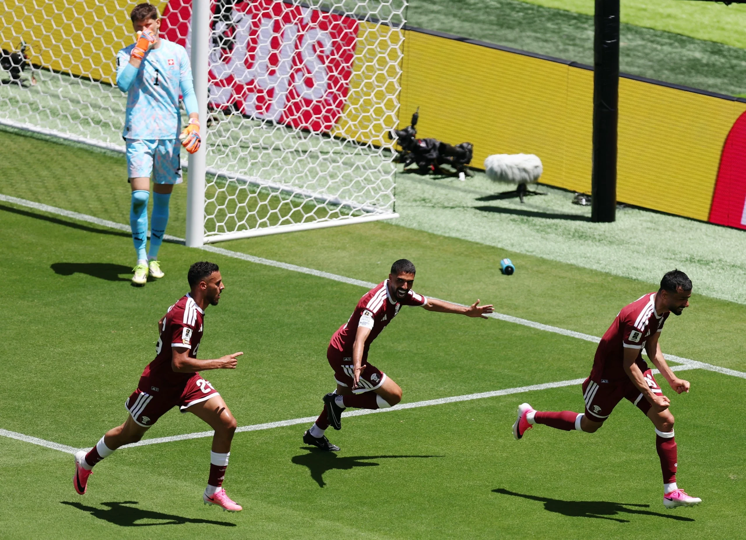 Qatar earn first ever World Cup point with late goal