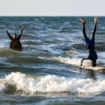 Gaza’s surfers seek solace in the sea