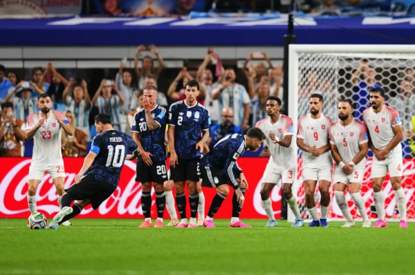 Messi scores again as Argentina head into World Cup last 32 on a high