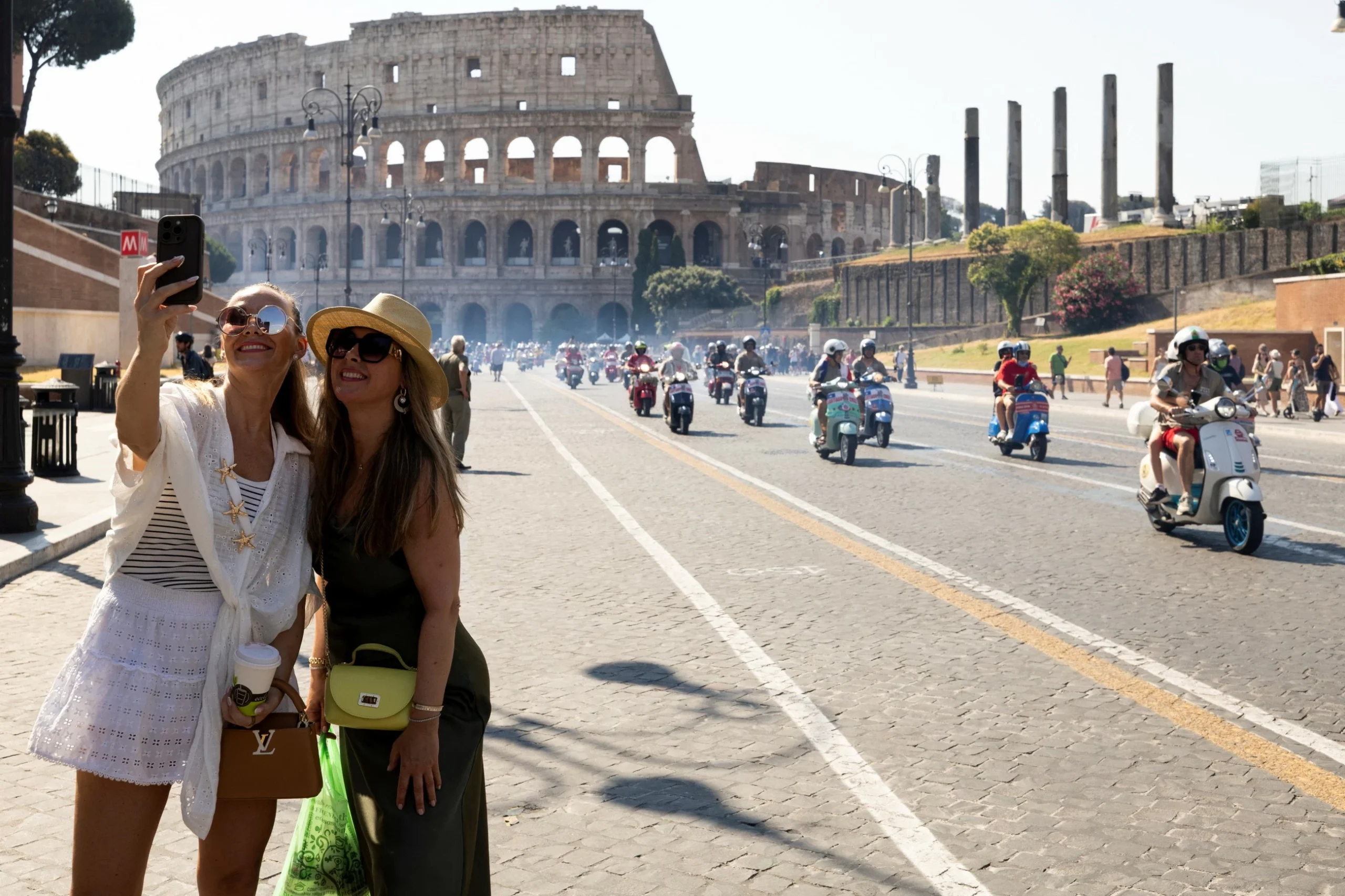 Thousands ride through Rome as Italy’s iconic scooter Vespa turns 80