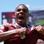 Qatar score late to clinch draw with stunned Switzerland​