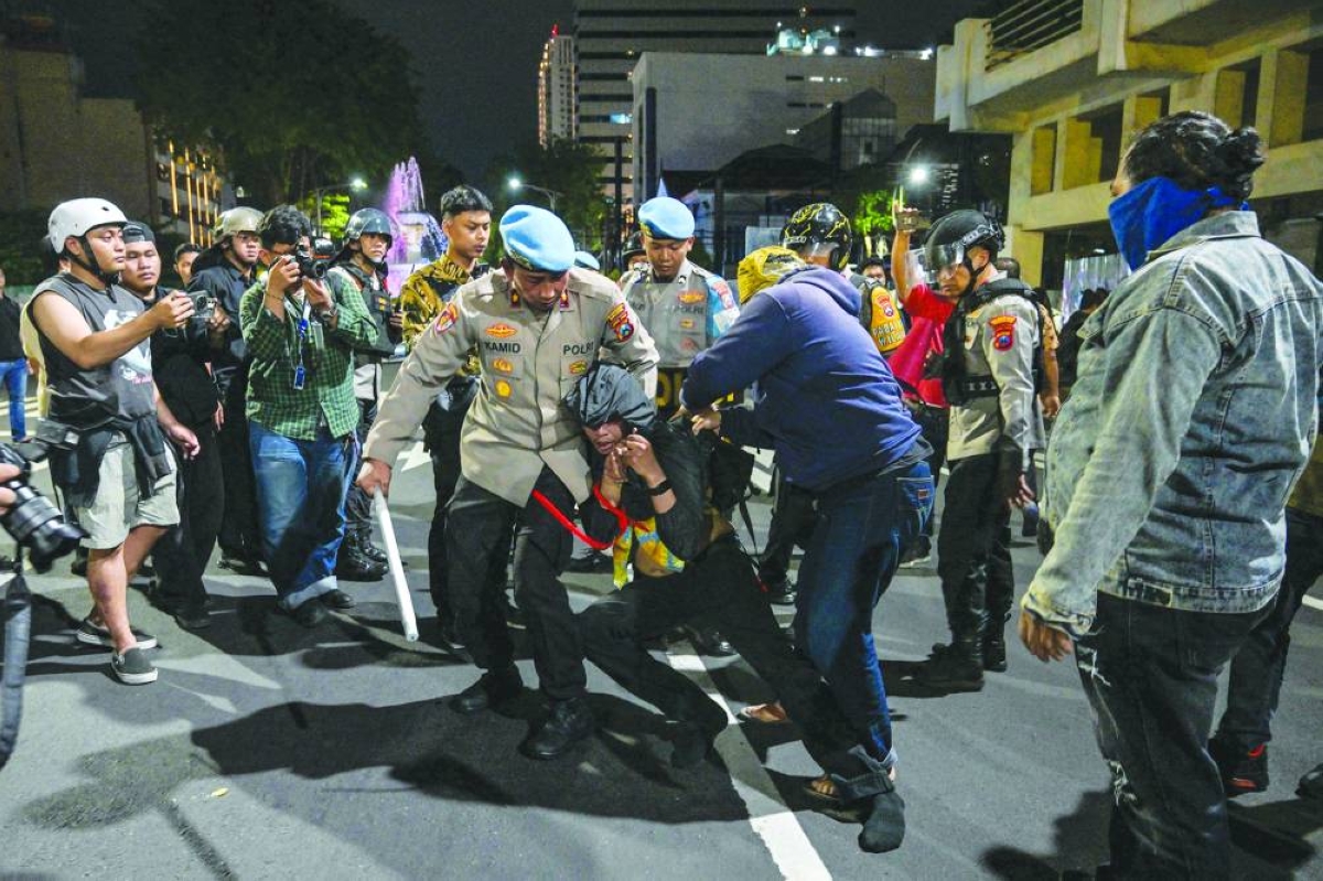 Indonesian police arrest dozens in anti-government protest