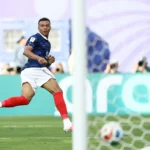 Mbappé scores twice to tie Messi for World Cup lead with …