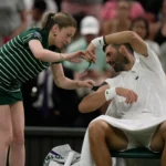 Djokovic scares ball girl, then eyes McIlroy’s Green Jacket
