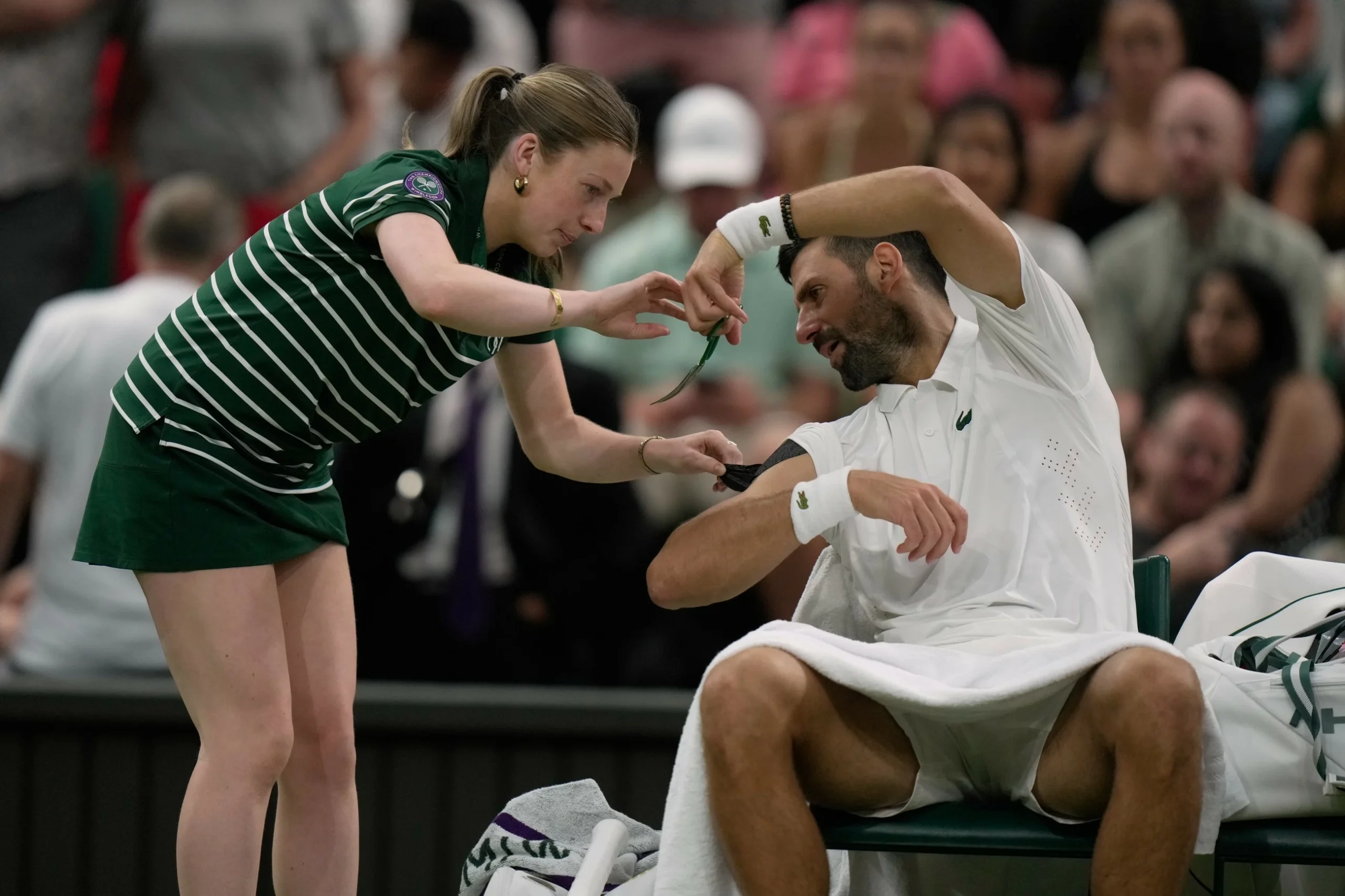 Djokovic scares ball girl, then eyes McIlroy’s Green Jacket