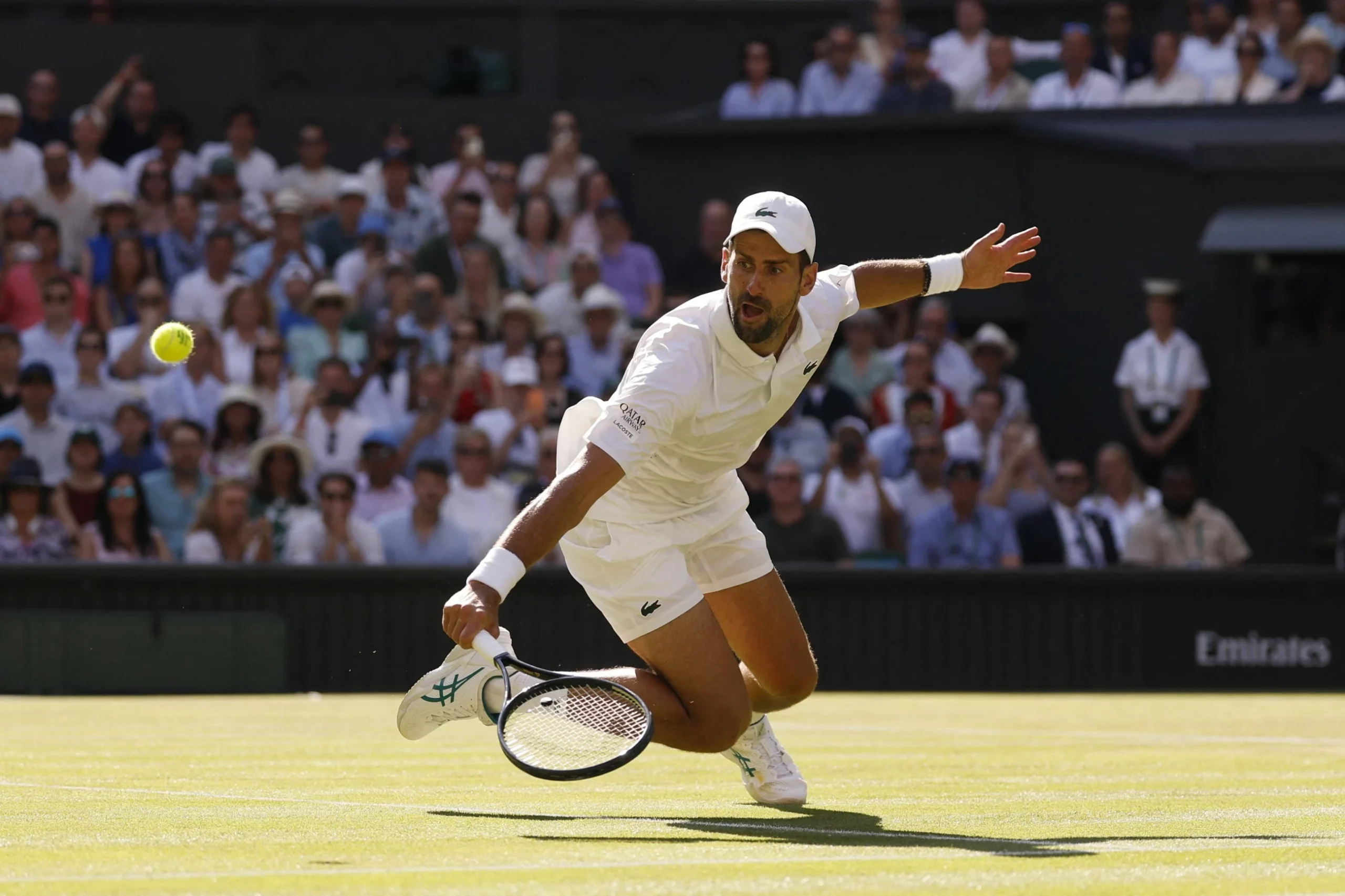Title rivals Djokovic, Sinner advance at Wimbledon
