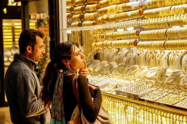 Gold holds near two-week high