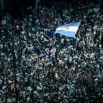 Tens of thousands of Argentine soccer fans celebrate thei…