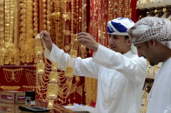 Gold slips from two-week peak