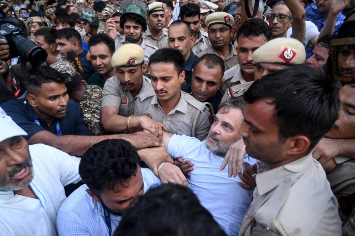 Thousands protest in India after clashes, despite Modi assuring action on exams