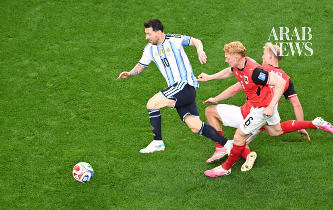 Milestone Messi sends Argentina to World Cup knockout stage