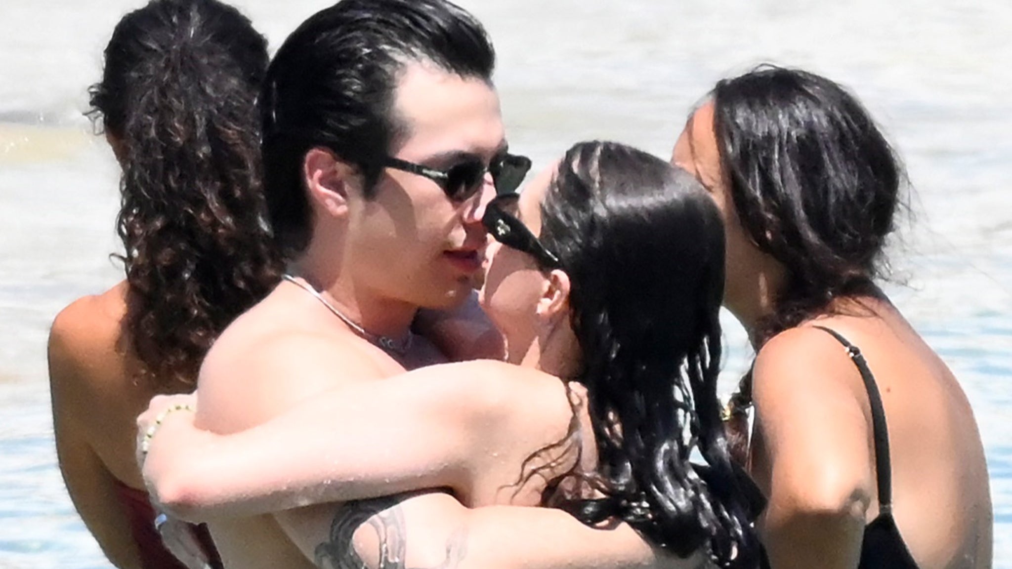 ‘Heated Rivalry’ Star Hudson Williams Packs on PDA With GF on Beach in Greece