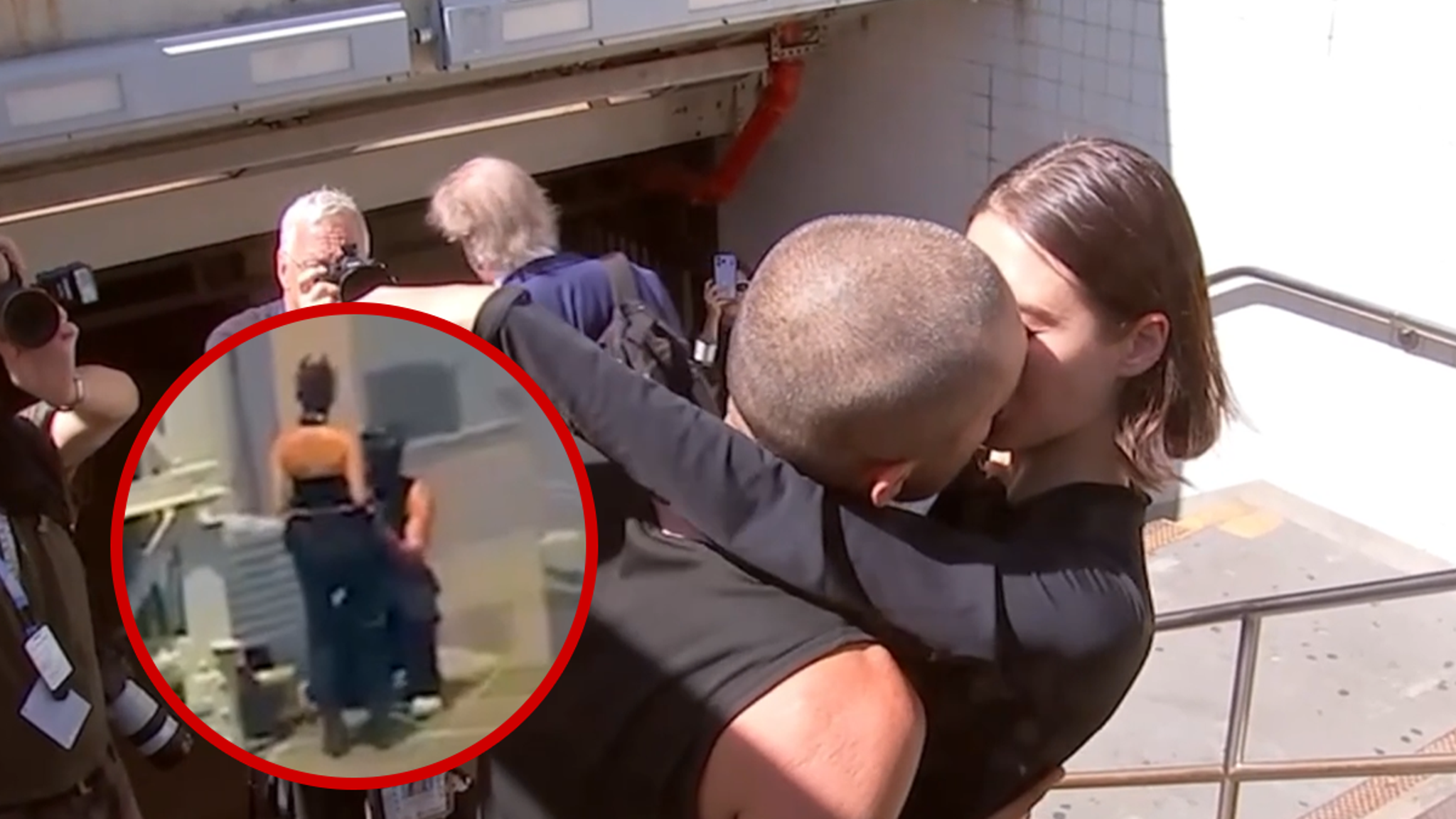 Empire State Building Climbers Kiss After Jail Release