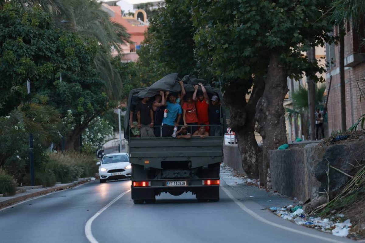 Spain defends Ceuta sovereignty after migrant rush